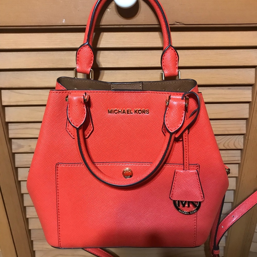 Michael Kors Orange Saffiano Leather Shoulder bag with matching wallet.